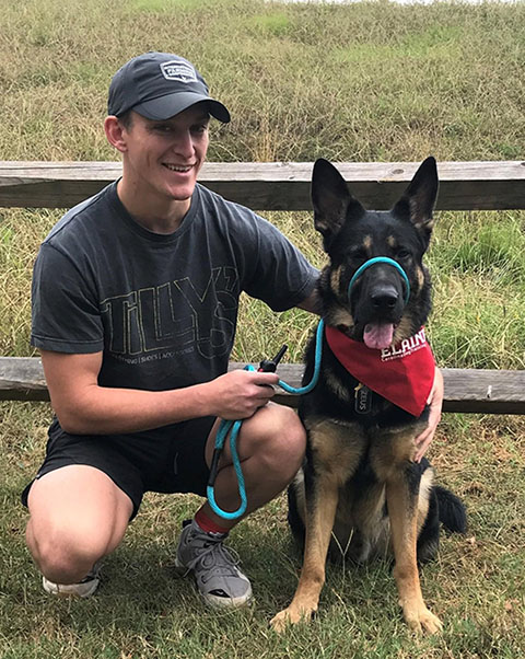Loose Leash - man with German Shepherd, Carolina Dog Training